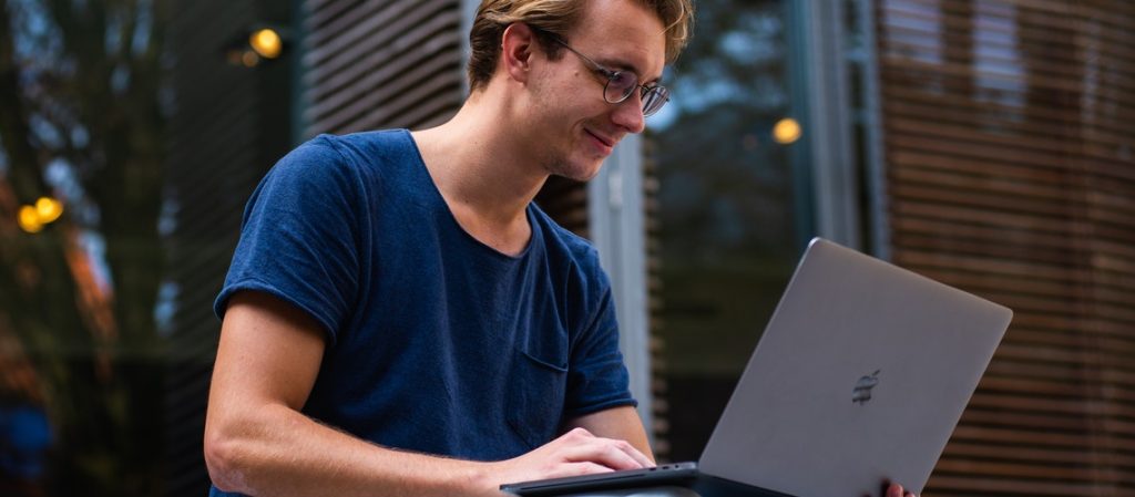 man using laptop for digital marketing